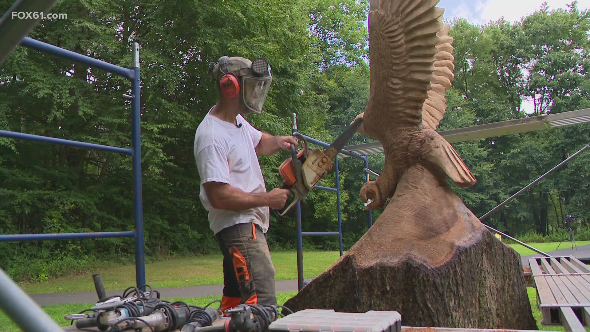 Jared Welcome's latest work was sculpted from a dead oak tree on the property of a Vietnam combat veteran in Orange.