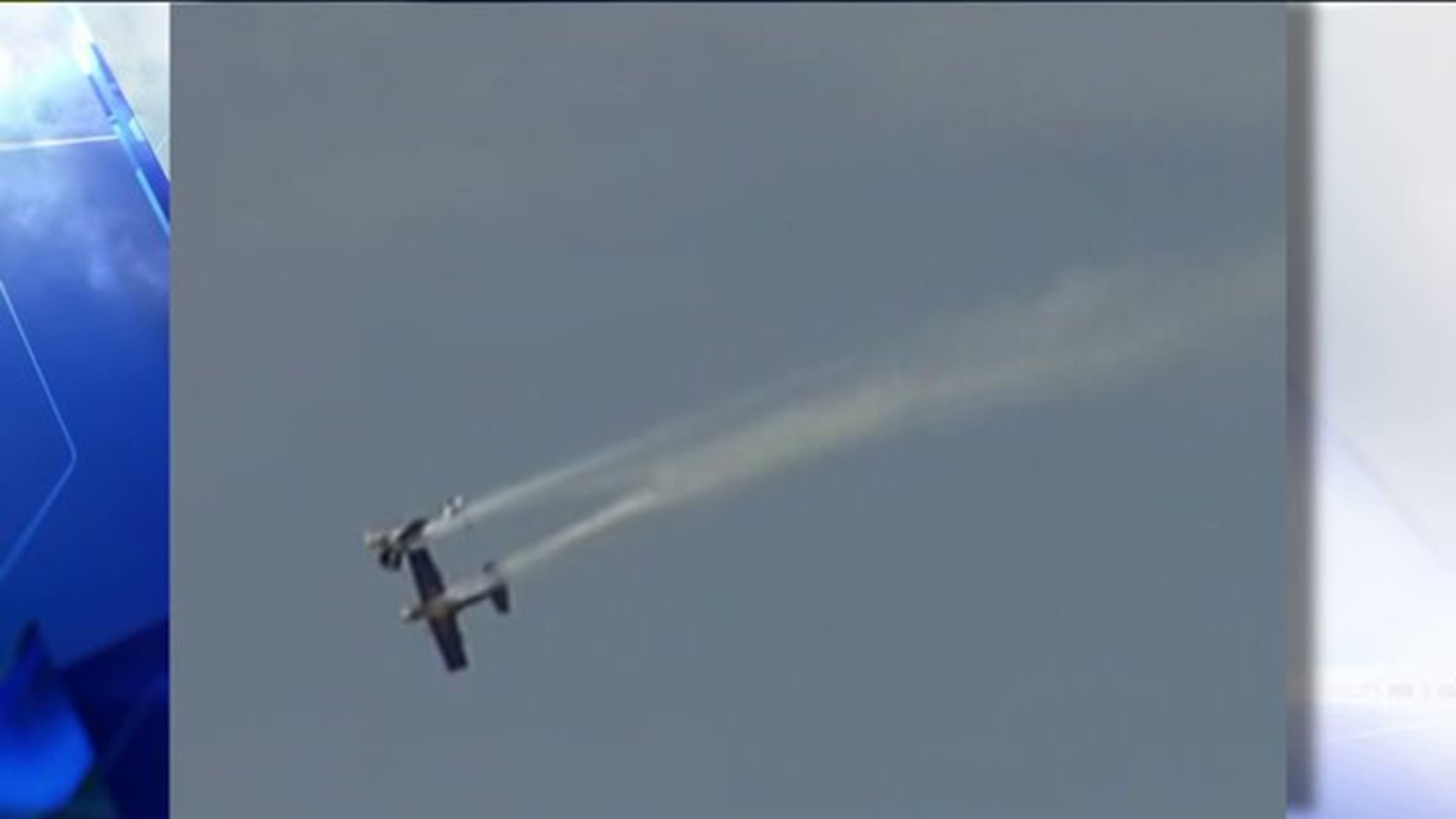 Stunt planes collide, land safely