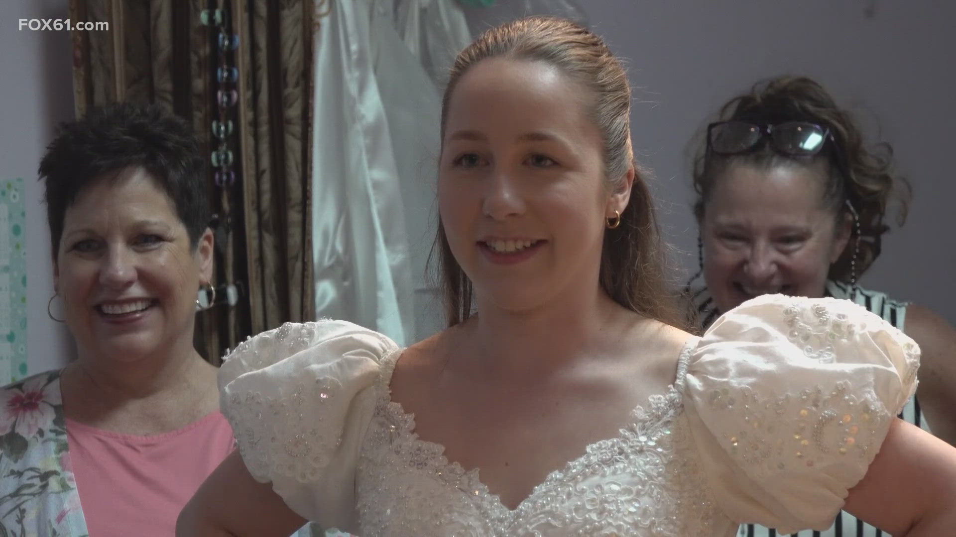 Newington woman repurposes mother's wedding dress for bridal shower