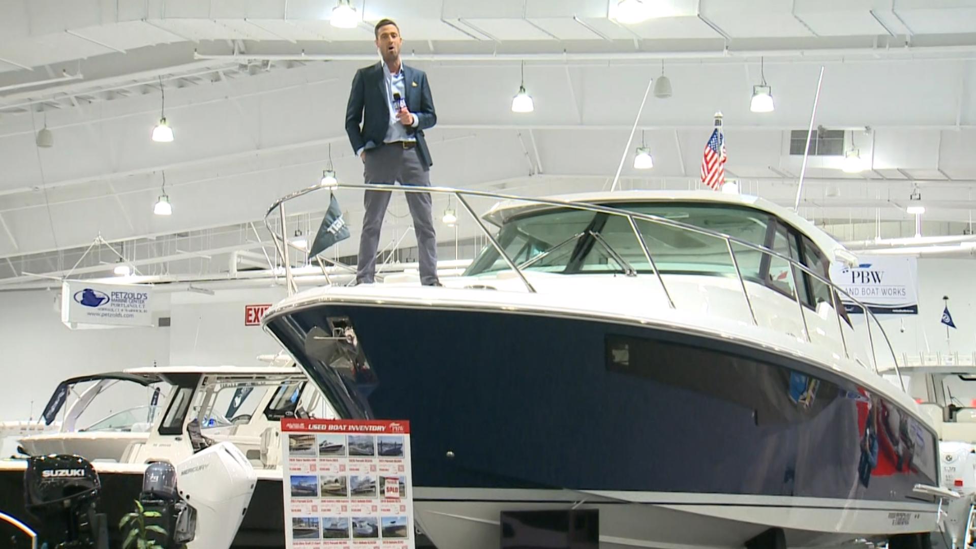 FOX61's Keith McGilvery checks out the boats on display at the Hartford Boat Show at Mohegan Sun. He also tests out a kayak in the pool.