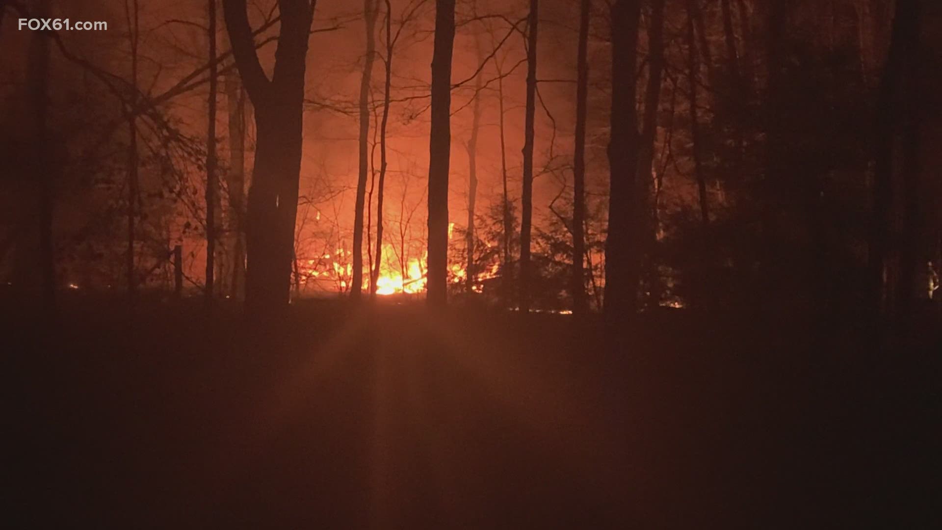 Fire spread from a barn to an unoccupied house.