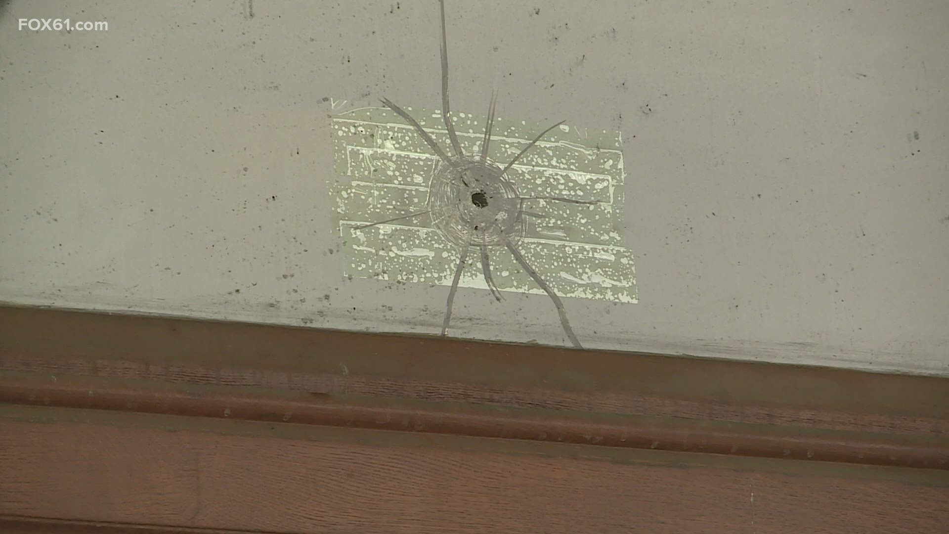 A bullet hole could be seen in the glass in one of the windows.