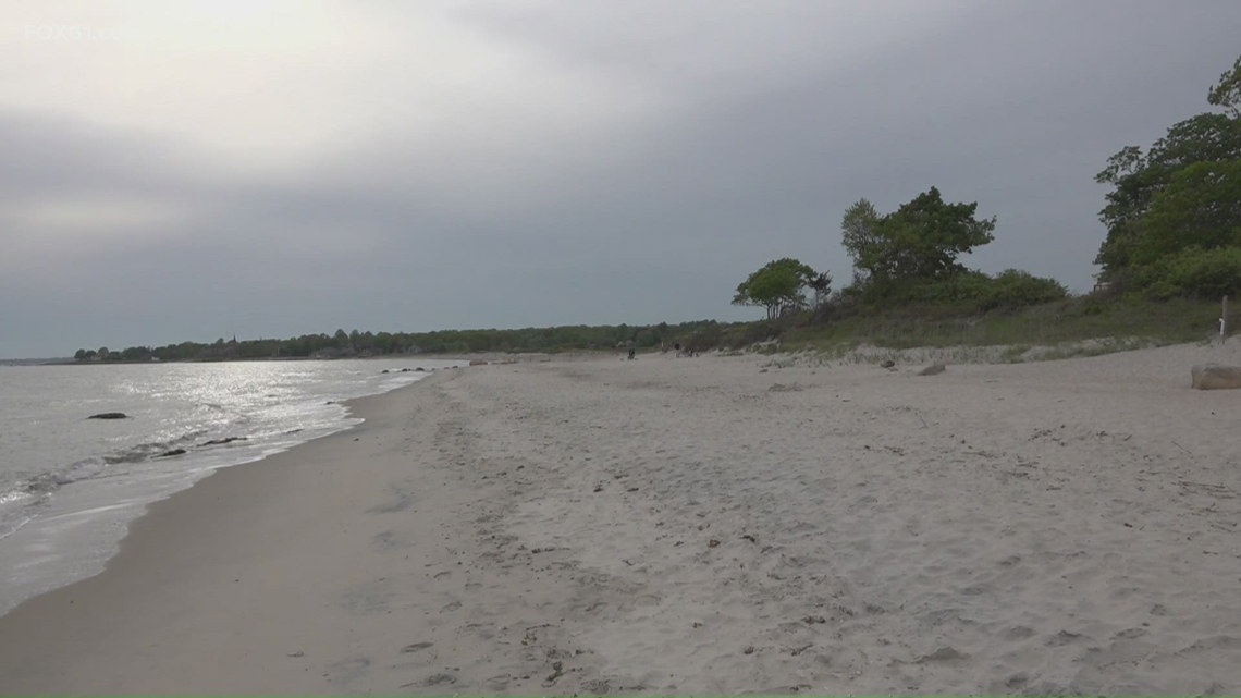People in CT brave the chill and head to the beach ahead of a rainy Memorial Day weekend
