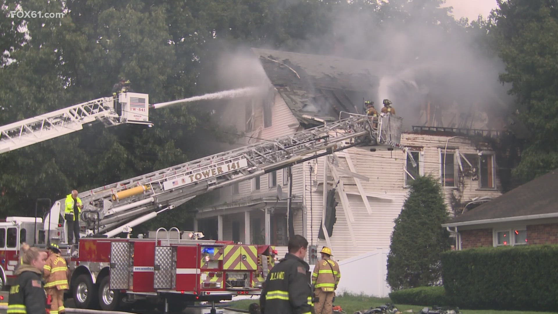 Neighbors said they heard a loud clap of lightning and then saw smoke billowing into the air.