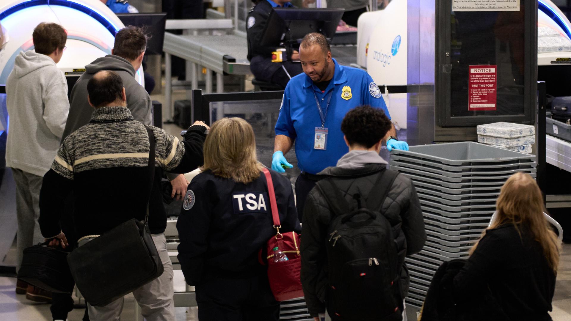Airports see hourslong lines due to spring break, partial government ...
