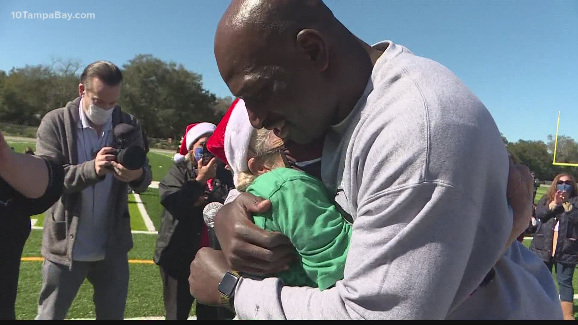 The WWE star brought a special Christmas gift to a veteran teacher at Sickles High School.