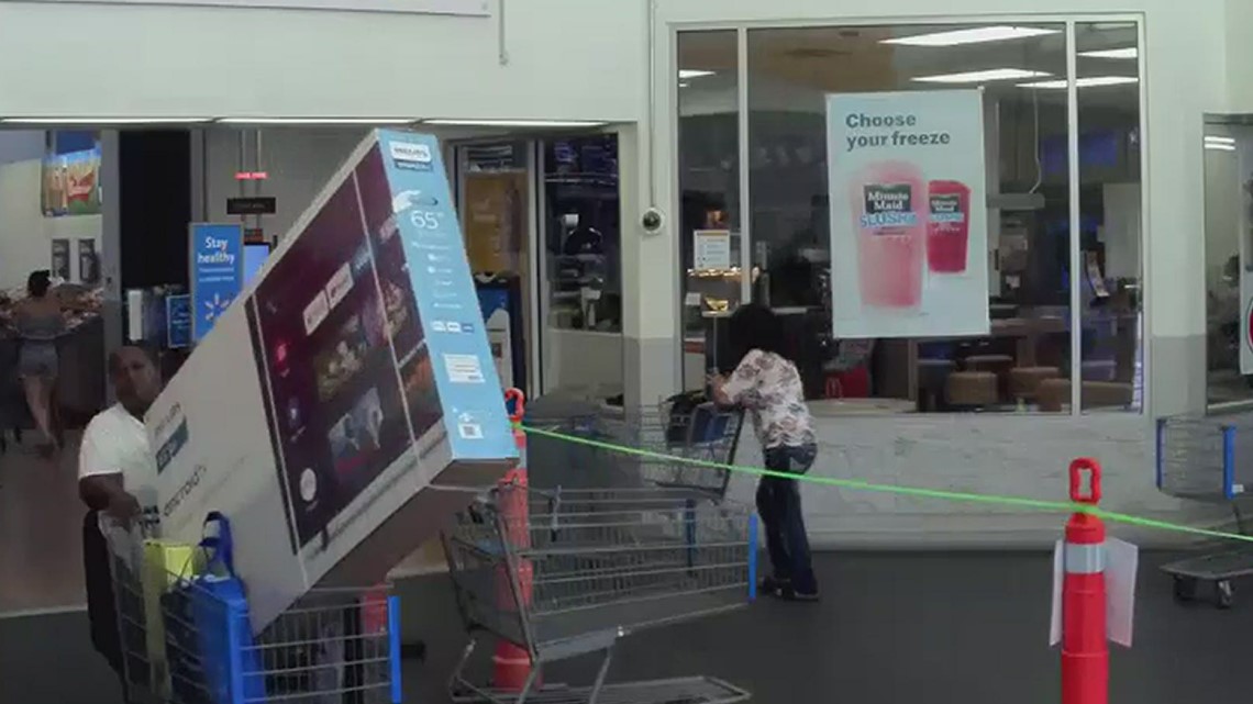 Woman caught on camera trying to steal TV from Mulberry Walmart | wthr.com