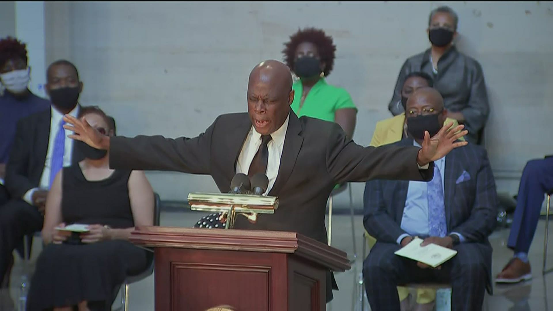 Rev. Wintley Phipps performs Amazing Grace at this ceremony of John Lewis at the Capitol Rotunda.
