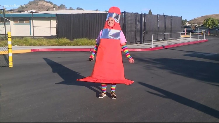 This assistant principal dresses up as a safety cone every day. Here's why | Get Uplifted