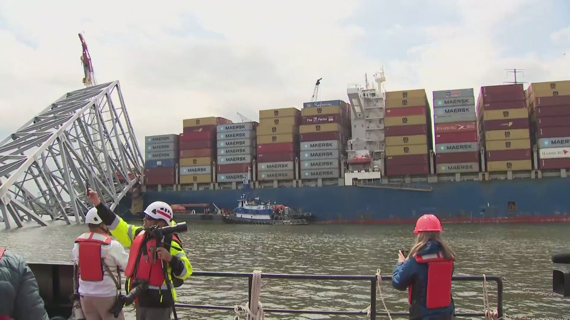 The first cargo ship passed through a newly opened deep-water channel in Baltimore after being stuck in the harbor since the Francis Scott Key Bridge collapsed.