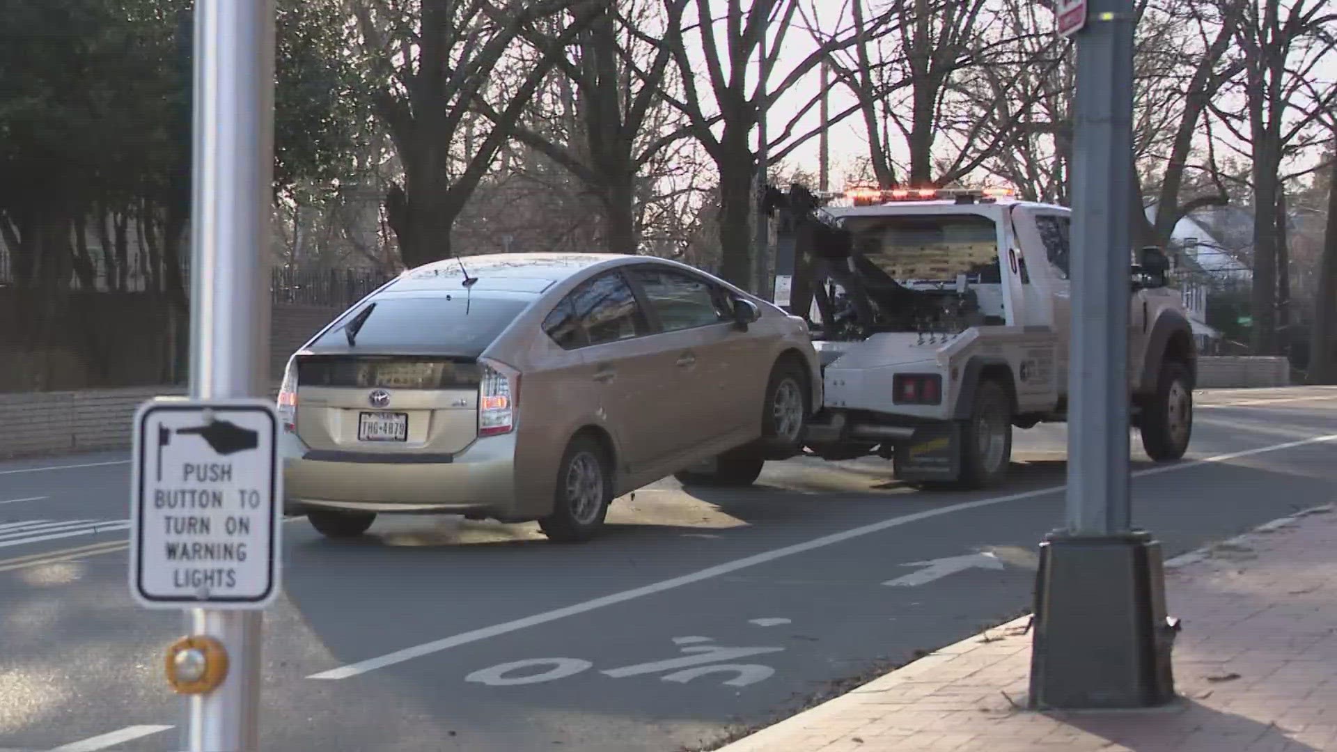 Police also investigated a "suspicious vehicle" it said may be connected to the man who set himself on fire, but the car was cleared at 4 p.m.