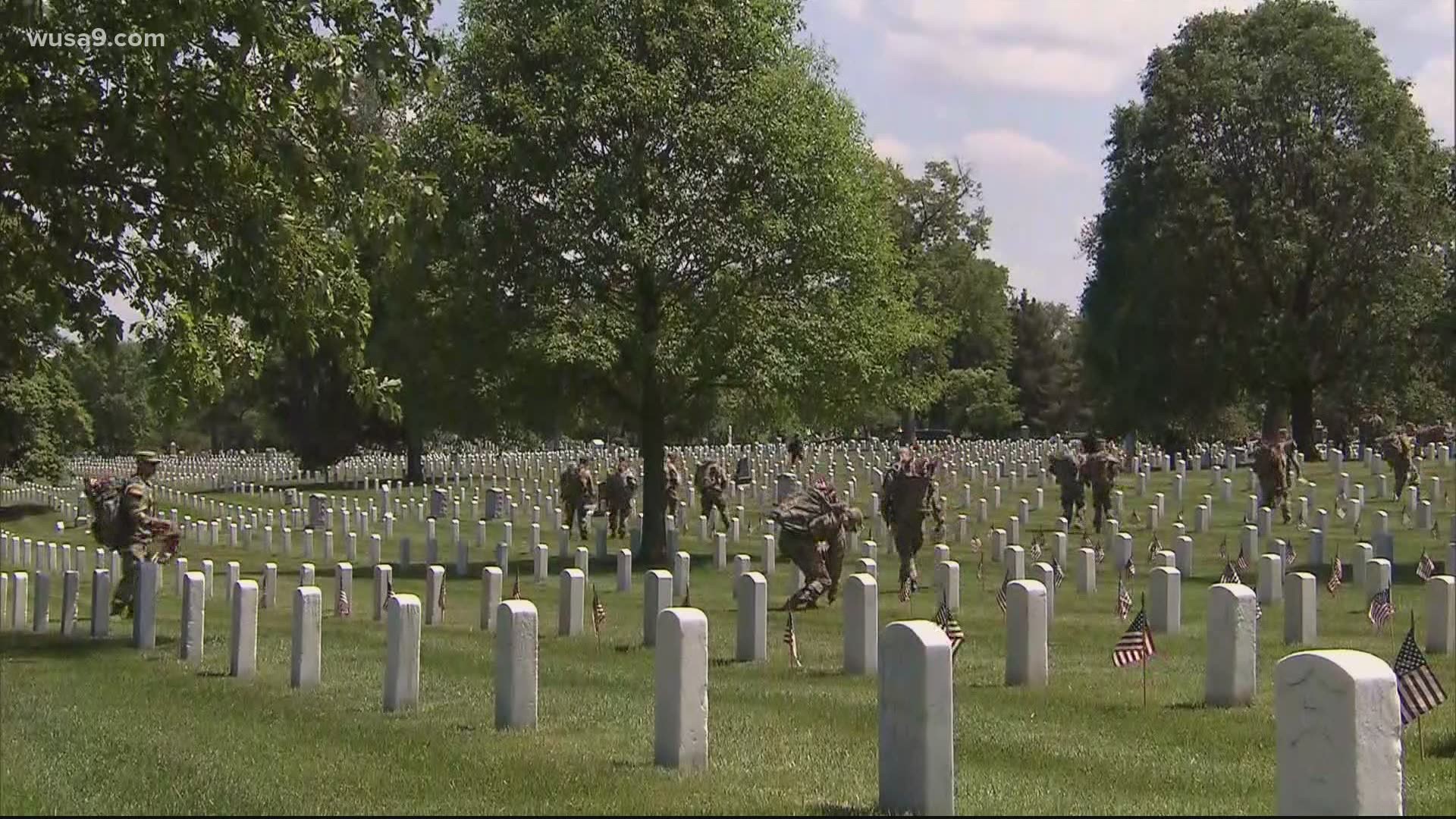 The flags in ceremony is an annual tradition at the cemetery.