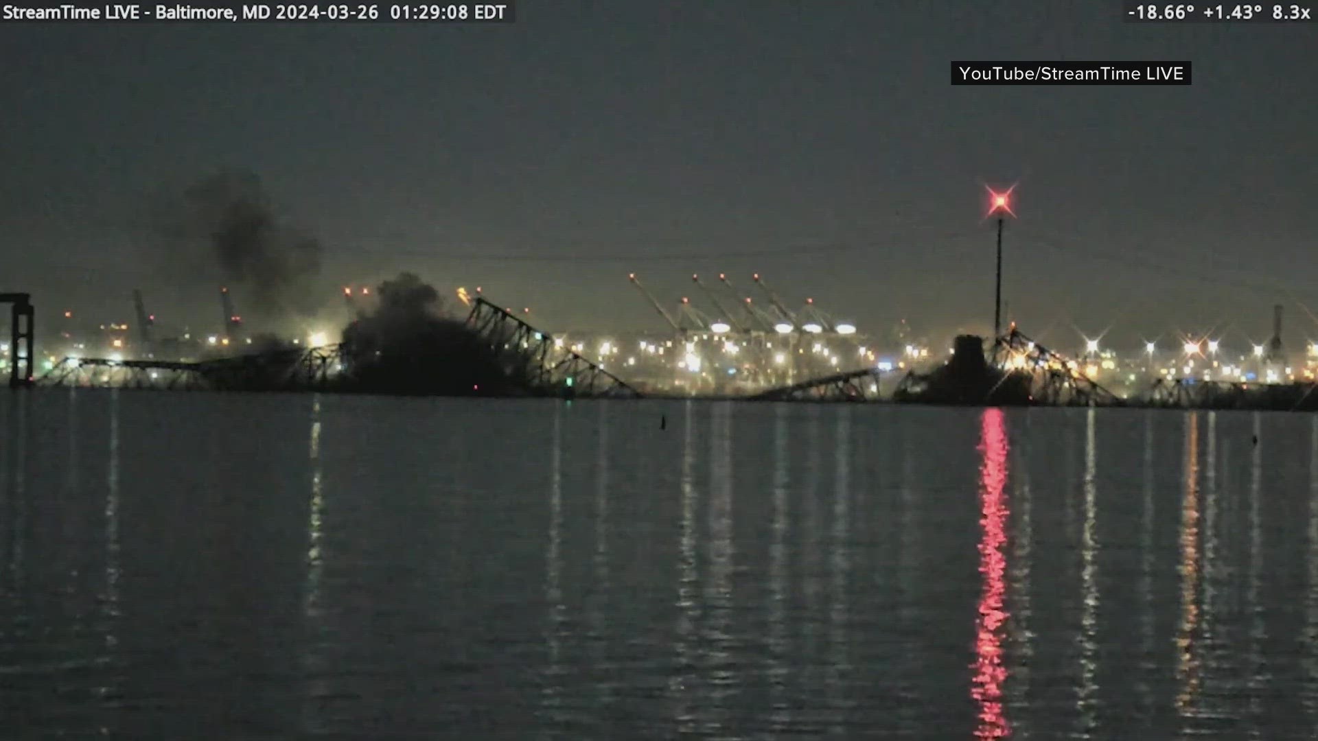 A cargo ship reportedly struck the bridge, bringing it down.