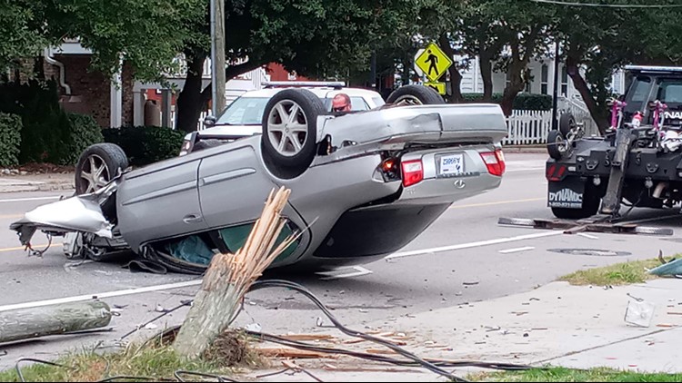 Driver crashes into telephone pole, flips car, gets out and runs away