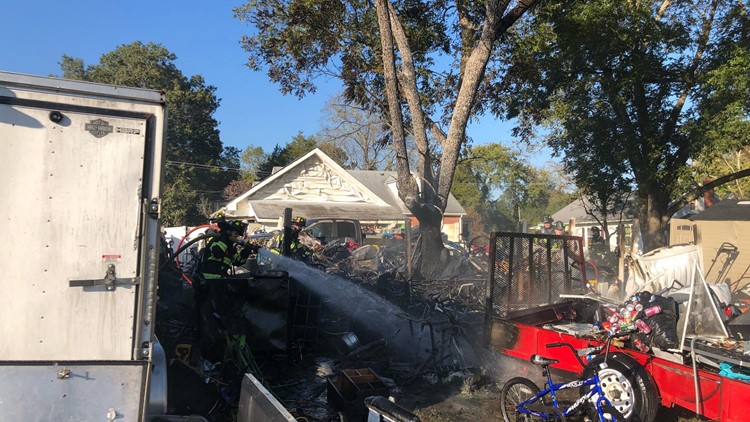 Fire engulfs Suffolk resident's backyard