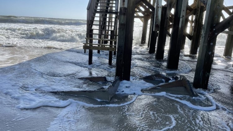 Overwash, house moving, and rip currents along beach in Rodanthe