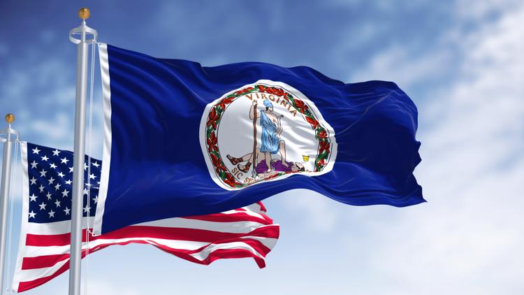 Why are flags at half-staff in Virginia on Tuesday?