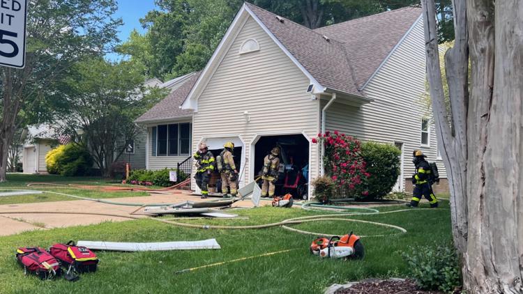 Chesapeake garage fire displaces 2 people, 4 animals