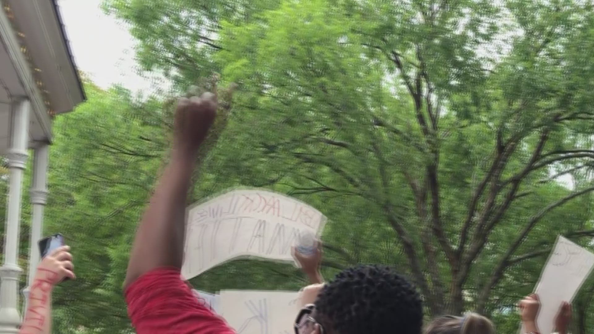 Protesters worked with police in Marietta to lead a peaceful march through downtown.