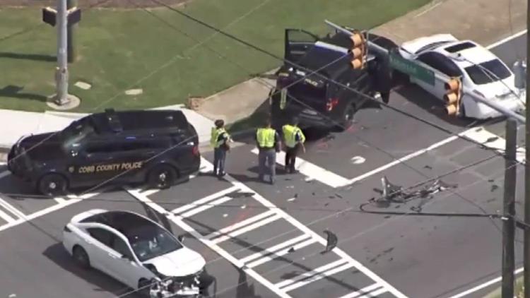 Cobb County officer, another driver taken to hospital following crash