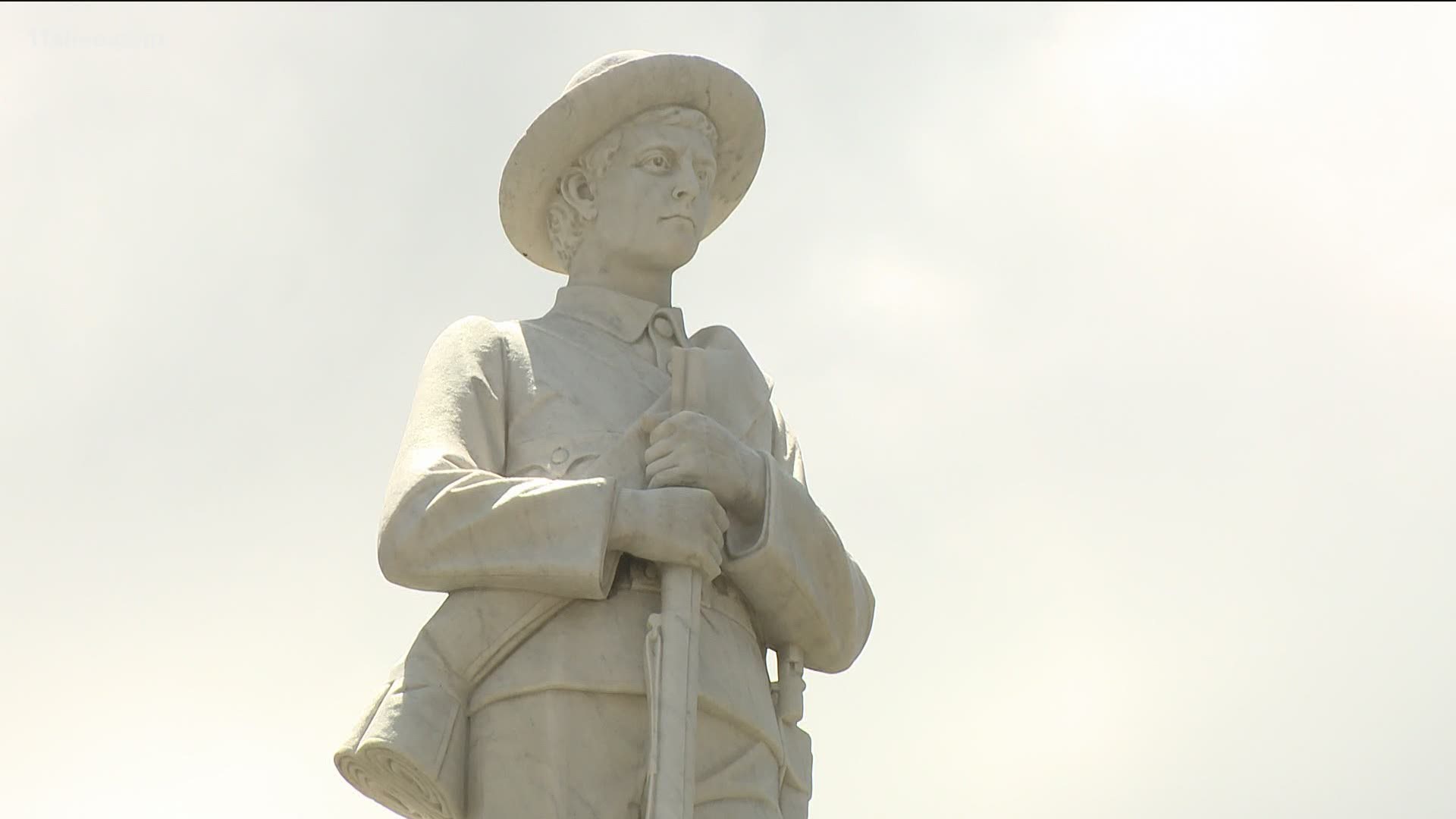 Activists gathered in front of the Douglas County Courthouse to call for the removal of a Confederate Statute and were immediately met with opposition.