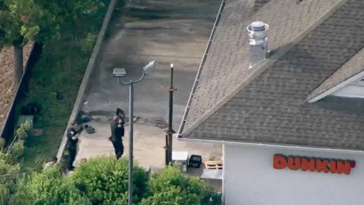 Suspect armed with gun barricaded himself inside restroom at Dunkin' doughnut shop in Newnan: police