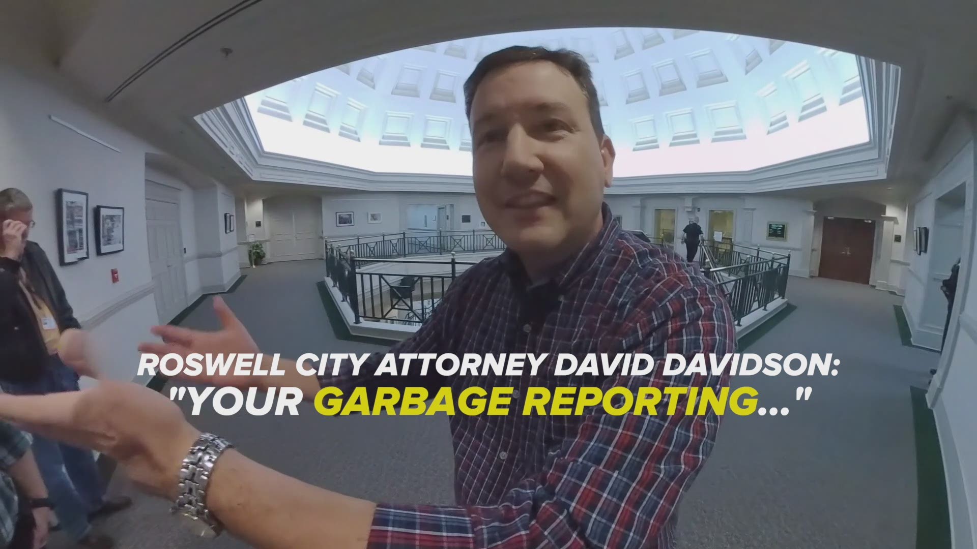 "GARBAGE REPORTING"
That's what Roswell's city attorney David Davidson called our series of investigative reports right before we were escorted out of City Hall by an armed city marshal. The city attorney claims an awards ceremony at City Hall -- with two dozen civilians and four city council members speaking to the crowd -- is a PRIVATE event, closed to the press. We were the only ones kicked out, under the threat of arrest for trespassing at City Hall because we didn't have "an invitation", after our series of investigative reports on the police department. 
The police chief resigned last week, the deputy chief also retired, three officers were fired, and the supervisor of the year was demoted after we demanded internal records. We were at the awards event to document several officers getting medals for saving a man's life.