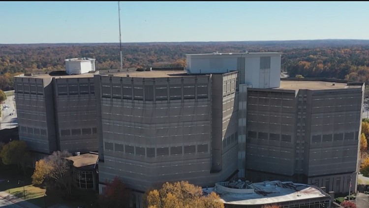 Mom, son arrested in connection with shooting at high school football game in DeKalb County