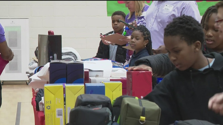 Program allows Atlanta elementary students to earn points to spend on holiday gifts for their loved ones
