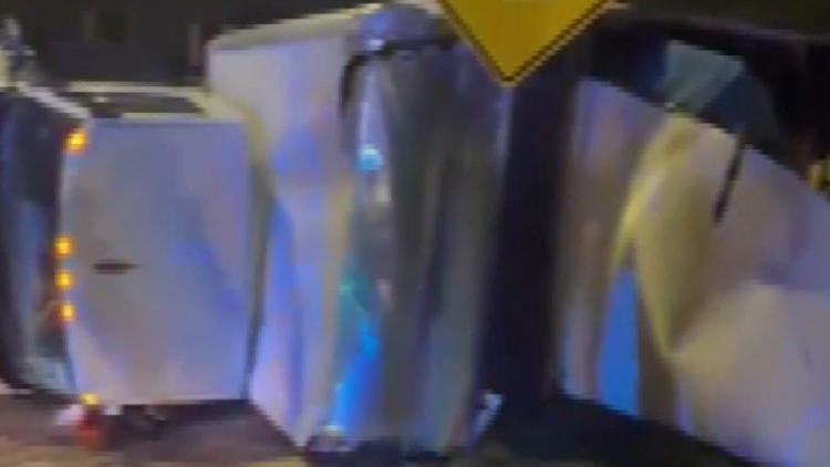 Truck driver rescued from beneath overturned rig in Atlanta credits 2 strangers with saving his life