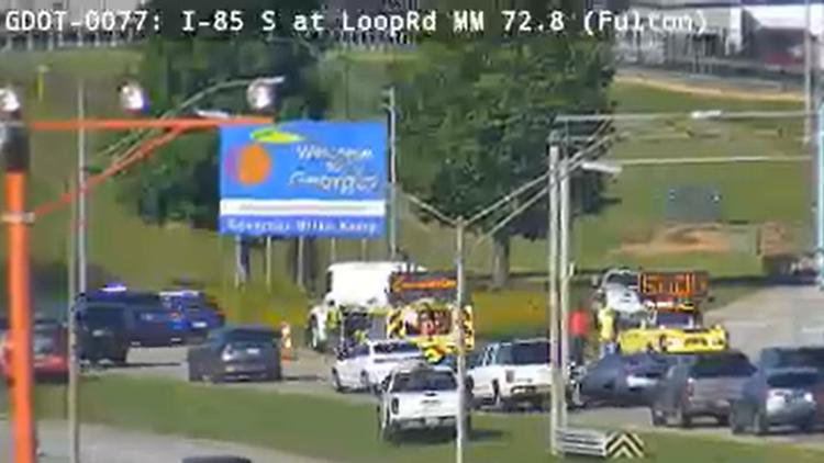 GDOT contractor killed after vehicle strikes workers on I-85 next to Atlanta airport, police say