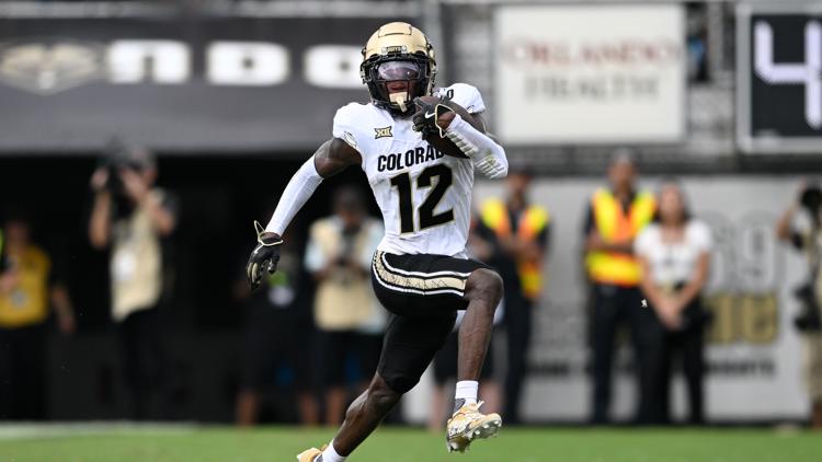 Travis Hunter, the 2-way standout for Colorado, is the AP college football player of the year