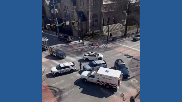 Several injured after a police vehicle collided with a car in Midtown Atlanta