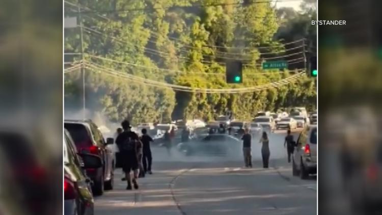 Metro Atlanta woman trapped in dangerous street takeover says her 911 calls went unanswered