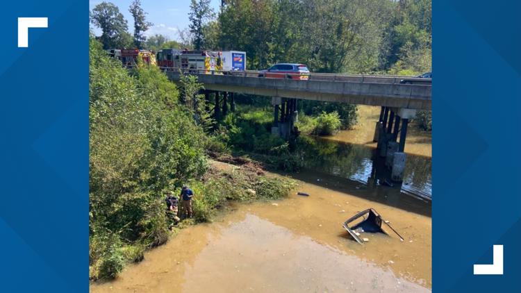 Driver dies after car drives off bridge on I-85, crashes into creek in Troup County