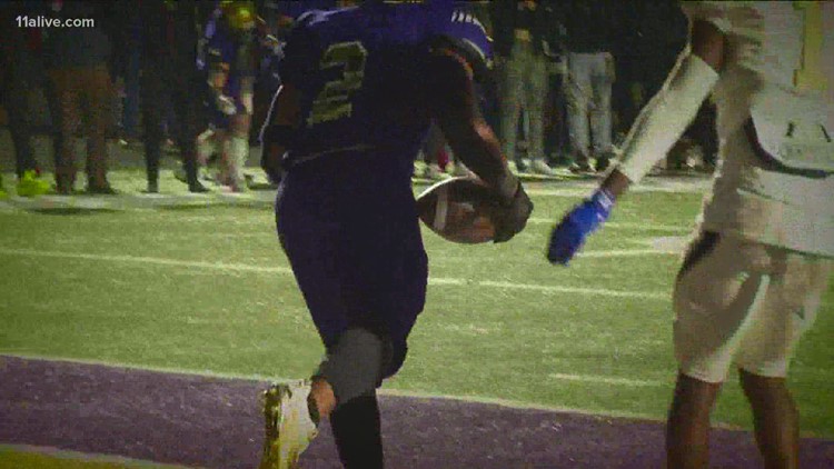 Five arrested after fight at East Coweta football game; firearm found