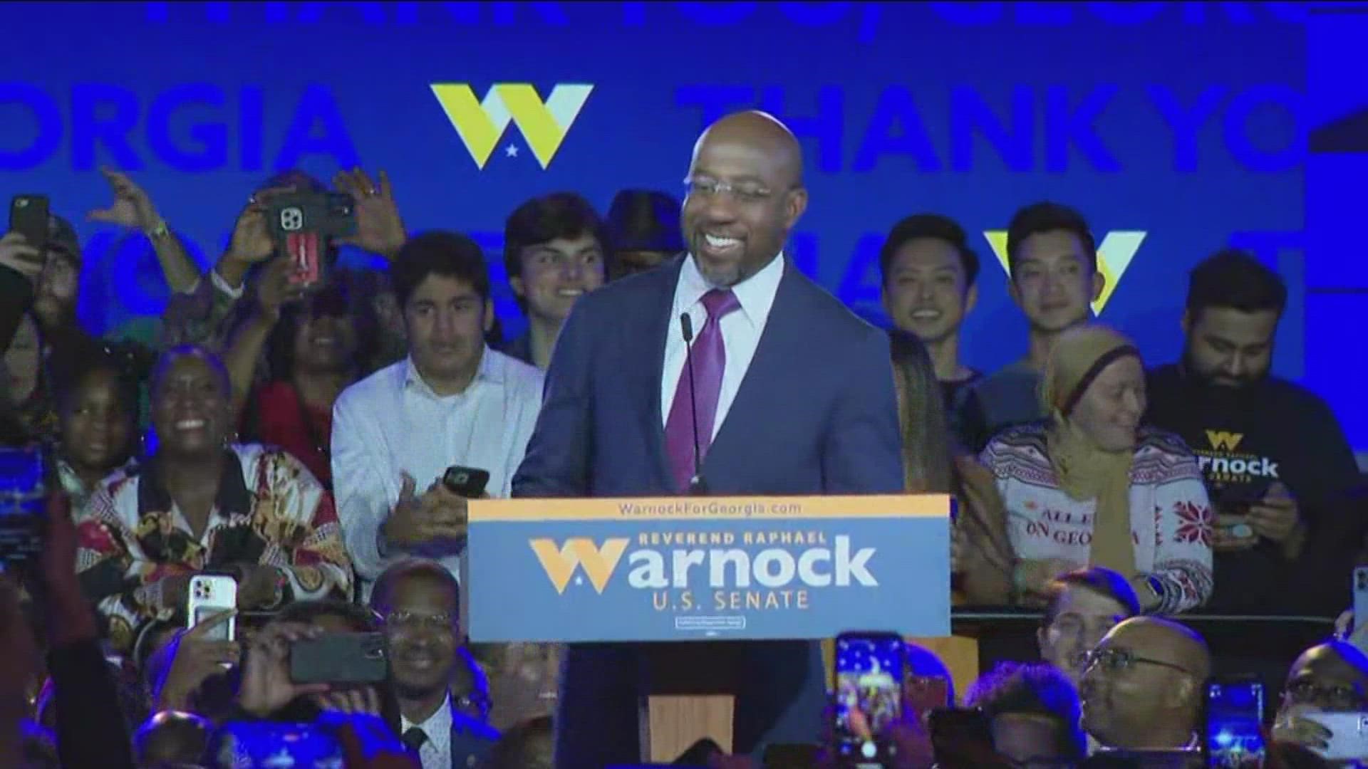 Sen. Raphael Warnock addressed the crowd Tuesday night after his Senate win.