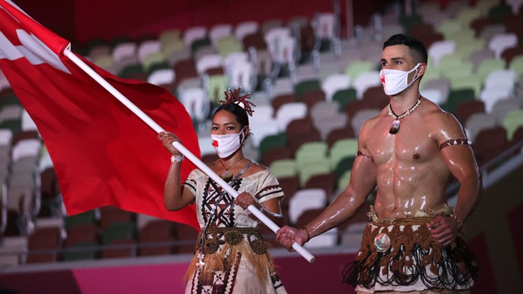 Tonga's shirtless flag bearer's fundraiser for tsunami relief gets nearly $400K in donations after just 2 days