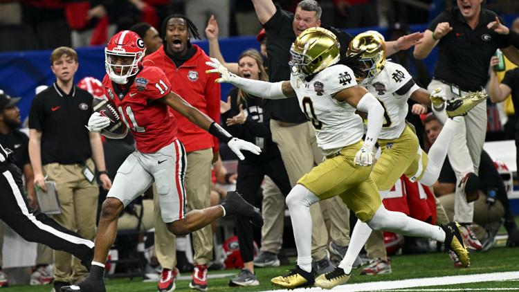 Georgia player called for 15-yard penalty after running into referee despite not being in full uniform