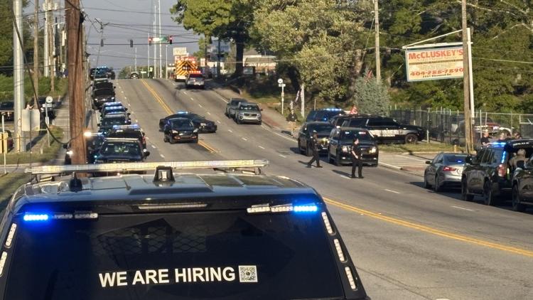 Officials: DeKalb officer released from hospital after shooting, 2 more men in custody