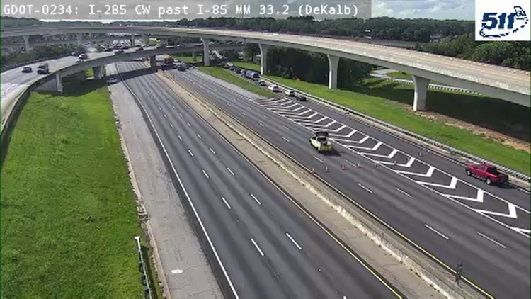 Traffic flowing on I-285 at I-85 near Spaghetti Junction in DeKalb County after police presence caused delays