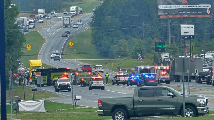 Two hospitalized after driver rear ends Clayton County Police escort SUV, sending it into SWAT vehicle