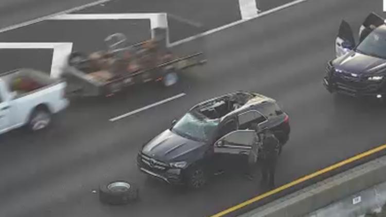 Accident report: Woman escaped with only minor cuts after truck tire bounced over median and slammed through her roof