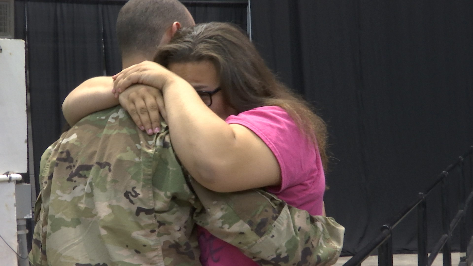 A senior airman hadn't seen his sister in a year and a half when he gave her a big surprise at her high school graduation rehearsal in Huntsville.