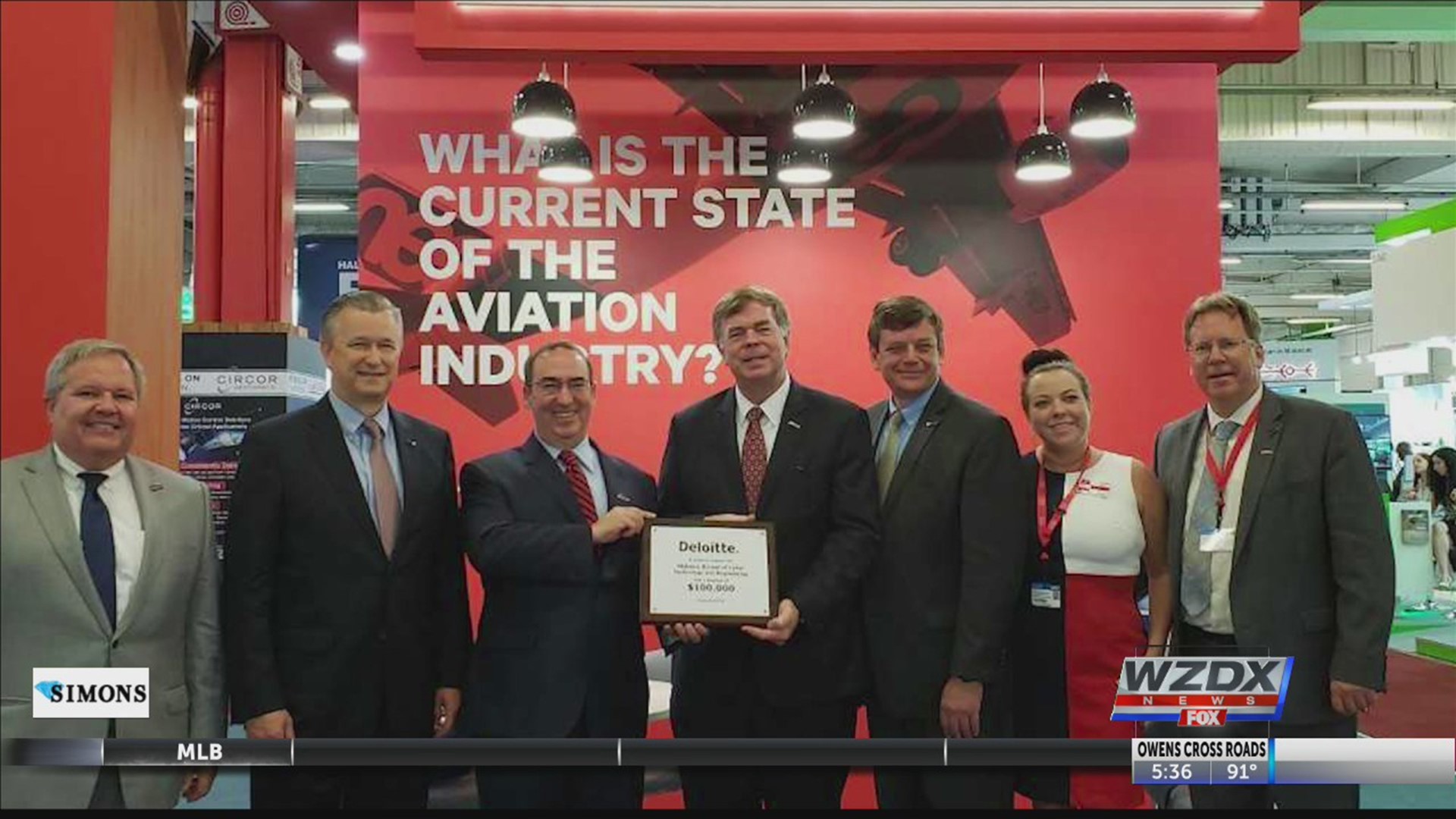 During a ceremony at the Paris Air Show, Deloitte presented a $100,000 gift to the Alabama school of Cyber Technology and Engineering Foundation.