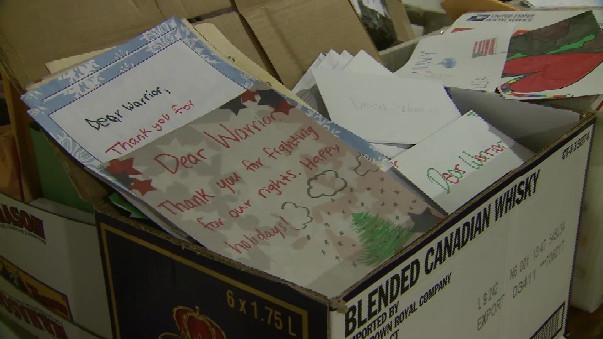 Woman gathers thousands of cards for troops.