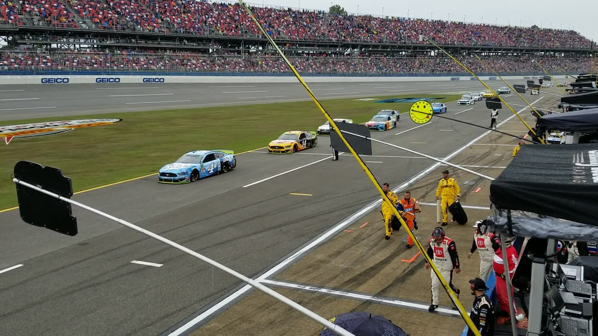 Talladega SuperSpeedway MENCS 1000bulbs.com 500 - Parking for rain. Cars coming into Pit Road as rain puts the race on "pause".