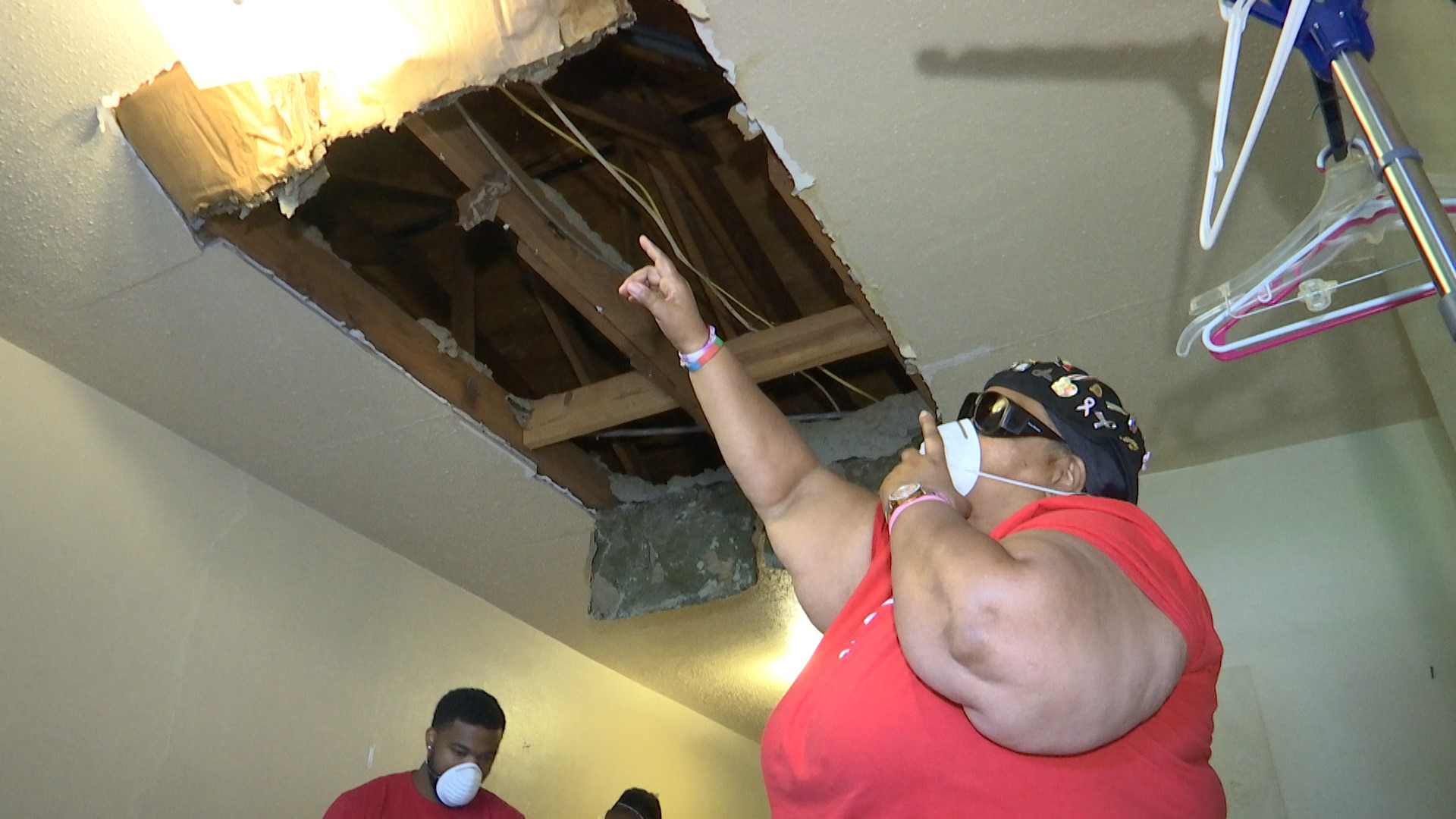 There's now a seven-foot hole in the ceiling of her public housing apartment in the Northwoods Community.
