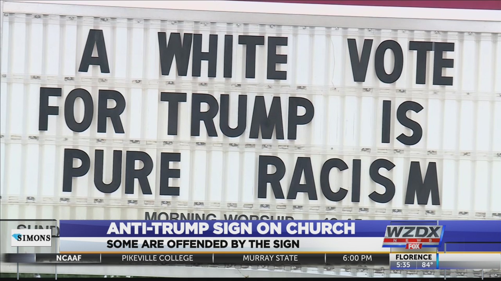 The sign outside of New Era Baptist Church in Birmingham is sporting a pair of controversial signs.