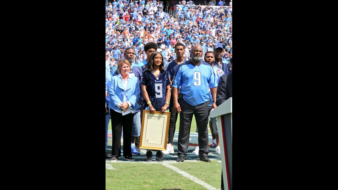 PHOTOS: Titans legends Eddie George, Steve McNair have jerseys retired